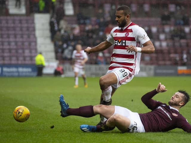 Hearts defender Craig Halkett challenges Marios Ogkmpoe during the 2-2 draw against Hamilton Accies in February 2020. Picture: SNS