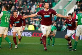 Fond memories: Andy Webster celebrates after scoring in a 3-1 victory over Hibs at Easter Road