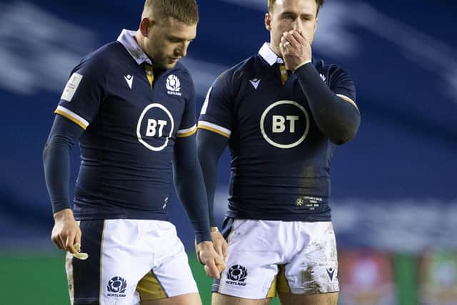 Stuart Hogg and Finn Russell at full-time after the Guinness Six Nations match between Scotland and Wales at BT Murrayfield on February 13, 2021, in Edinburgh. (Photo by Paul Devlin/SNS Group)