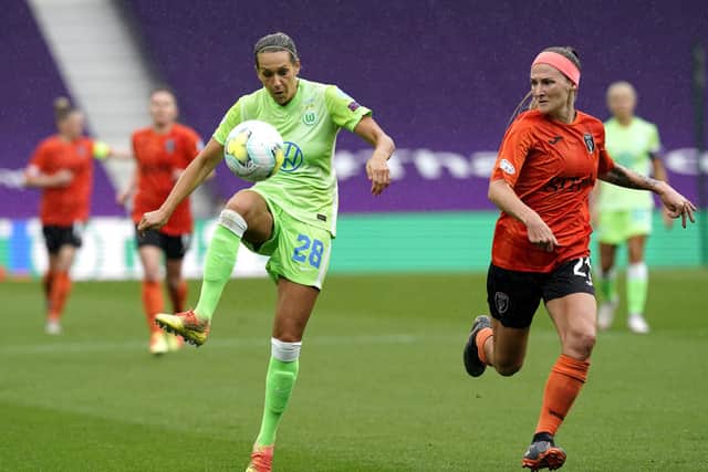 Krystyna Freda keeps tabs on Wolfsburg's Lena Goessling during a Champions League quarter-final match in August 2020