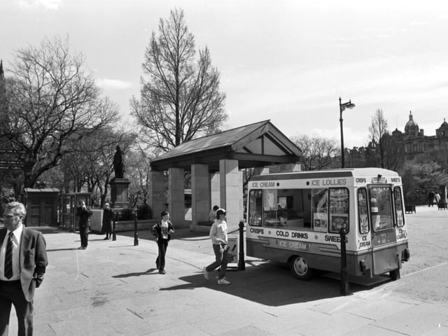 The Greek temple-shaped 'pedestrian plaza' in Edinburgh's Princes Street Gardens with an ice cream van parked beside it in May 1989.