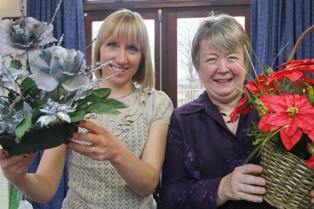 Rebecca Mcdermott and Jane Logan with their floral designs at Ashgate Hospice Christmas Fayre in 2008