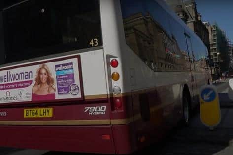 Lothian Buses double-decker clips a traffic island - City Cabs blame new road regulations