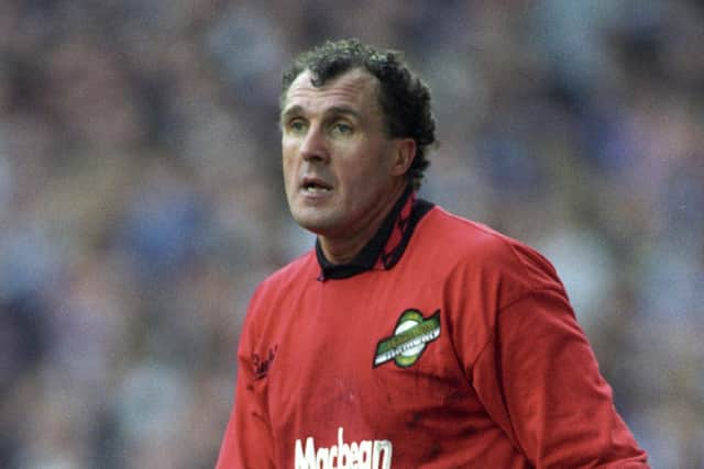 John Burridge in action for Hibs in March 1993 - the goalkeeper will return to Easter Road for the Hanlon Stevenson Foundation charity match