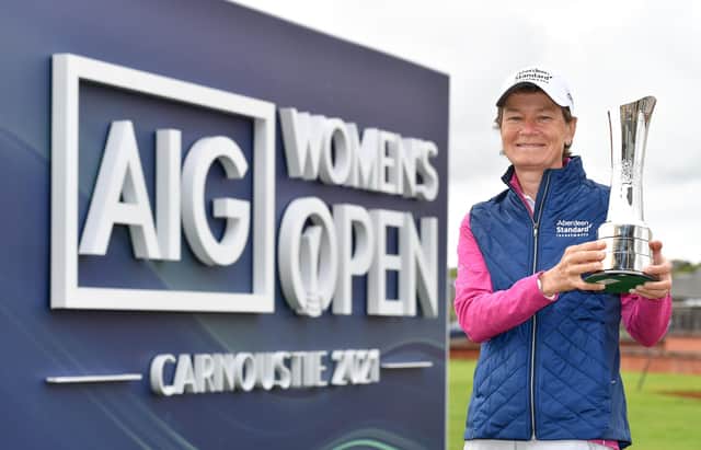 Former winner Catriona Matthew poses with the AIG Women's Open trophy during a visit to Carnoustie ahead of this year's event in August. Picture: Mark Runnacles/Getty Images/R&A.
