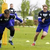 Sylvester Jasper and Elias Melkersen in a race to the line at Hibernian Training Centre near Tranent
