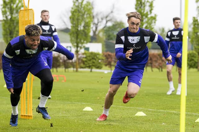 Sylvester Jasper and Elias Melkersen in a race to the line at Hibernian Training Centre near Tranent