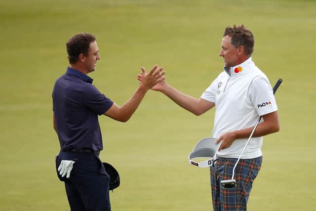 Justin Thomas and Ian Poulter shake hands at the end of the final round in the abrdn Scottish Open at The Renaissance Club. Picture: Luke Walker/Getty Images.