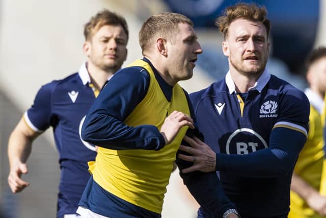 Stuart Hogg (right) says Finn Russell has been a huge help to him in training as gets to grips to playing at stand-off. Picture: Craig Williamson/SNS