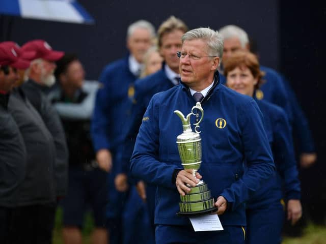 R&A chief executive Martin Slumbers brings out the Claret Jug for the trophy presentation for the 148th Open Championship at Royal Portrush in 2019. Picture: Stuart Franklin/Getty Images.