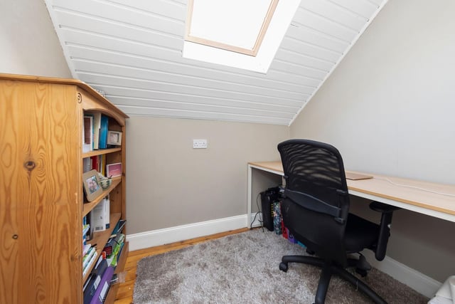 The upstairs box room/study makes for an ideal home office space.