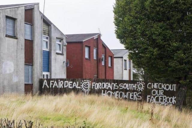 Graffiti in Deans South calling for a fair deal for homeowners