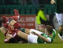 Ryan Porteous and Christian Ramirez have a coming together at the half-way line during Hibs' 1-0 win over Aberdeen. Picture: SNS