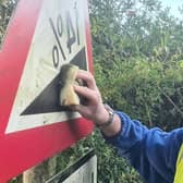 Businessman Richard Hopley has voluntarily cleaned near to 200 signs in and around Edinburgh and the Scottish Borders