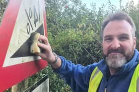 Businessman Richard Hopley has voluntarily cleaned near to 200 signs in and around Edinburgh and the Scottish Borders