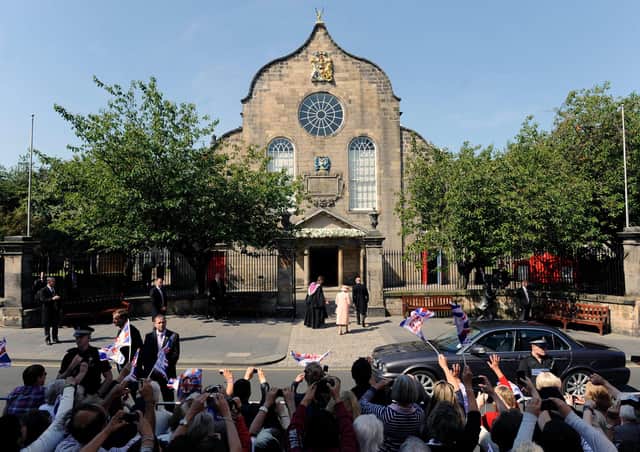 The Queen and Prince Philip arrive at Canongate Kirk for the wedding of their grand-daughter Zara Phillips.   Picture: Ian Rutherford