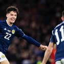 Aaron Hickey celebrates Scotland going 2-0 ahead against Spain at Hampden Park. Picture: Craig Foy / SNS