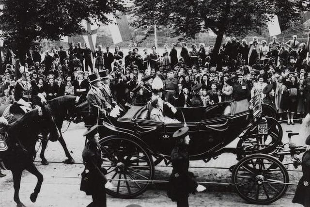 After her coronation, the Queen made a state visit to Edinburgh, which included this procession with the Honours of Scotland on June 24, 1953.
The state visit, on which the Queen was accompanied by her husband, the Duke of Edinburgh, took place from Tuesday June 23 until Monday June 29. The city was decorated for the occasion and a large programme of events was planned.
The Royal party arrived at Princes Street Station at 10am and made its way to the Palace of Holyroodhouse. A map was produced showing the routes of the processions on each day and crowds of people, including many children, lined the streets to watch the pageantry.