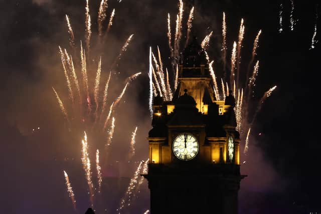The Balmoral strikes midnight as fireworks light up the sky in Edinburgh during the Hogmanay celebrations in 2019/20. Picture: Andrew Milligan