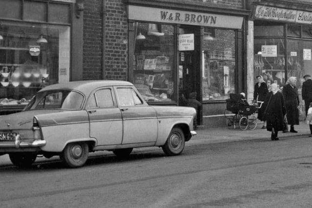 A shopping scene in Station Road, Hebburn, but what make of car is it?