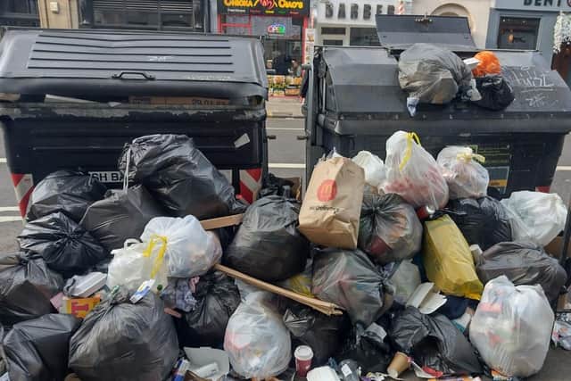 Bin workers are now clearing up the rubbish that piled up during their 12-day strike.