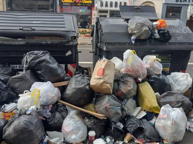 Bin workers are now clearing up the rubbish that piled up during their 12-day strike.