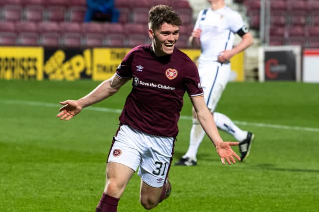 Euan Henderson is all smiles after scoring against Alloa in Hearts' final game before winning the title. Picture: SNS