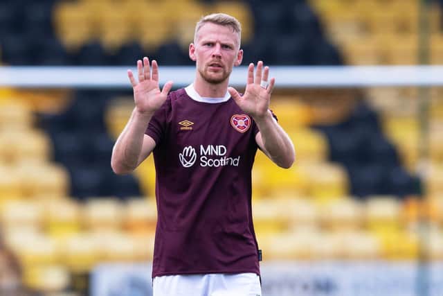 Stephen Kingsley apologises to the fans at full time during after losing 1-0 to Livingston. He says Hearts must get back to basics and start getting clean sheets. Picture: Paul Devlin / SNS