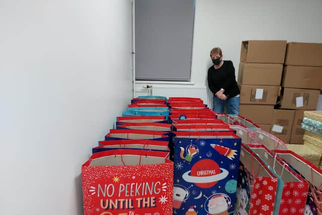 Aileen with Christmas boxes at the Gorebridge Hive.