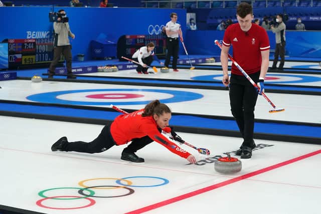 Jenn Dodds and Bruce Mouat in action during their victory over Canada