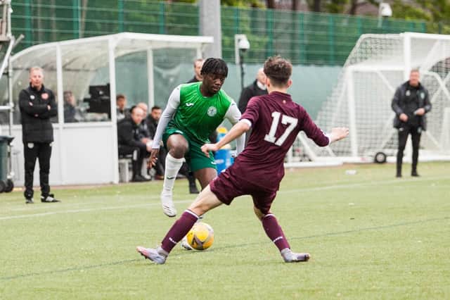 Kanayo Megwa looks to get forward for Hibs on the right side. Picture: Maurice Dougan