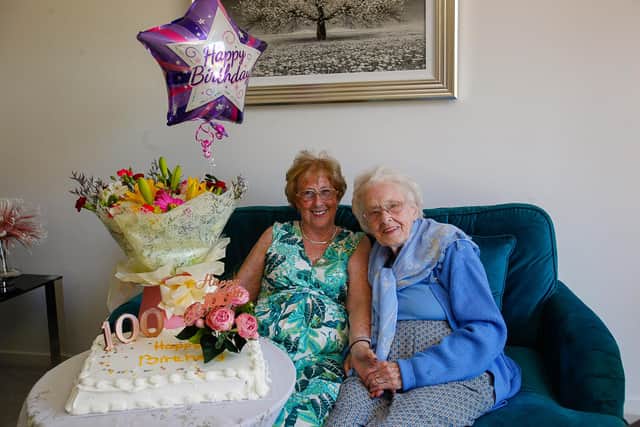 Janet Houston celebrating her 100th birthday with daughter Margaret Kelly