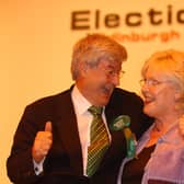 Robin Harper of the Green Party and independent Margo MacDonald in good spirits at the 2003 election count at Meadowbank as they learn they have both won been elected as Lothian MSPs (Picture: Neil Hanna)