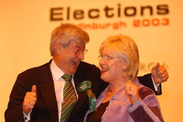 Robin Harper of the Green Party and independent Margo MacDonald in good spirits at the 2003 election count at Meadowbank as they learn they have both won been elected as Lothian MSPs (Picture: Neil Hanna)