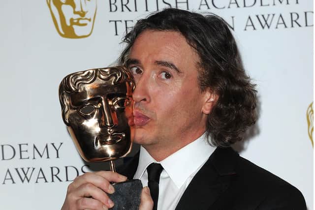 Steve Coogan with the Bafta Award he won in 2011 for The Trip, his spoof travel show with Rob Brydon. Pic: Joanne Davidson/Shutterstock