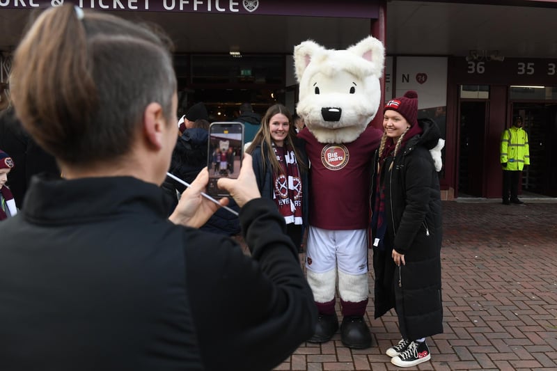 Hearts fans with the mascot before the home match against Dundee United at Tynecastle in February