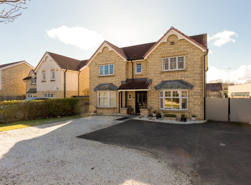 To the front of the property there is a large driveway with double gates leading to the generous sized south facing garden, with a single garage, which has been converted into a gym/office.
