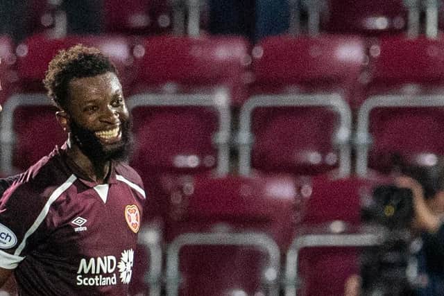 Beni Baningime is all smiles after his Hearts debut.