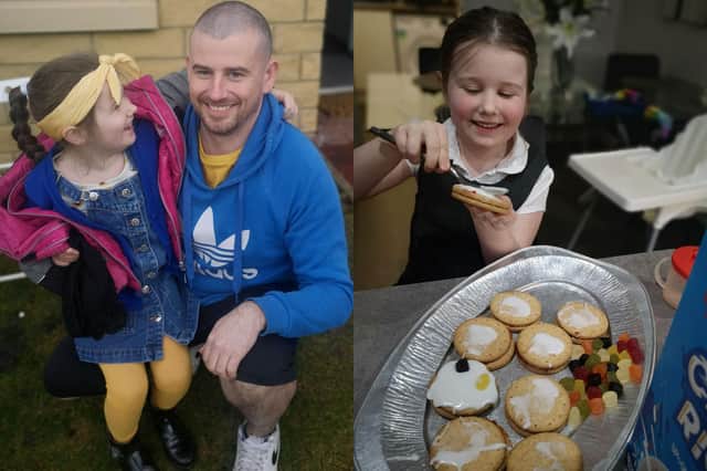 Ivy with her dad Gary, who had his hair shaved to raise money for the appeal, and also baking her cakes.