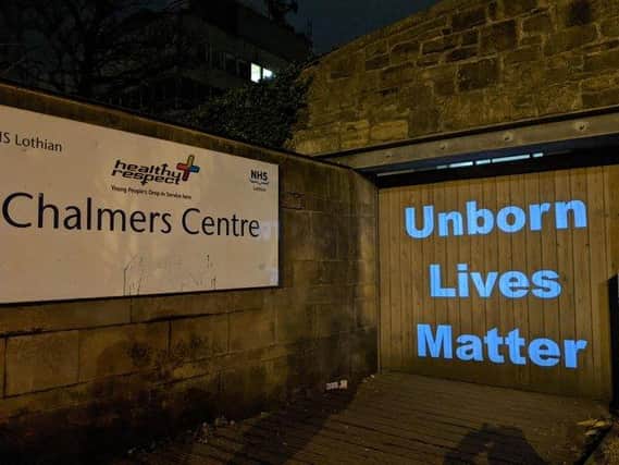A campaigner has spoken after witnessing a pro-life supporter being hit with a car outside a sexual health clinic