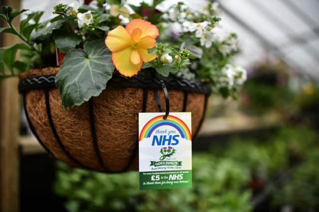Staff at a garden centre prepare to reopen to the public in May 2020 (Photo: Jeff J Mitchell/Getty Images)