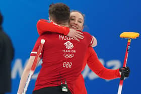 Great Britain's Edinburgh duo Jenn Dodds and Bruce Mouat celebrate winning their mixed doubles match against Canada during round robin session 2 in Beijing