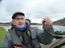 William 'Phally' Cowan with his fly find, picked up in a Fife fishery car park.