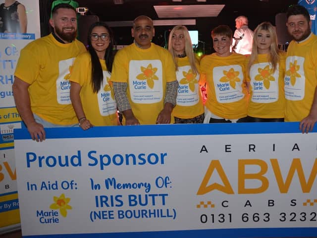 Jimmy Butt and his family, at the recent Loanhead fundraiser for Marie Curie, in memory of his late wife Iris.
