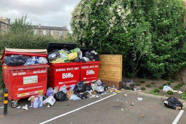 Overflowing bins are a major headache for locals.