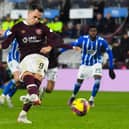 Lawrence Shankland converts his penalty to make it 3-1 to Hearts and wrap up the win over Kilmarnock at Tynecastle Park. Picture: SNS