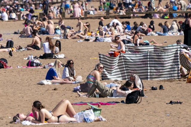 Edinburgh's Portobello Beach was jam-packed on Tuesday as locals enjoyed the hottest day so far this year in Scotland.