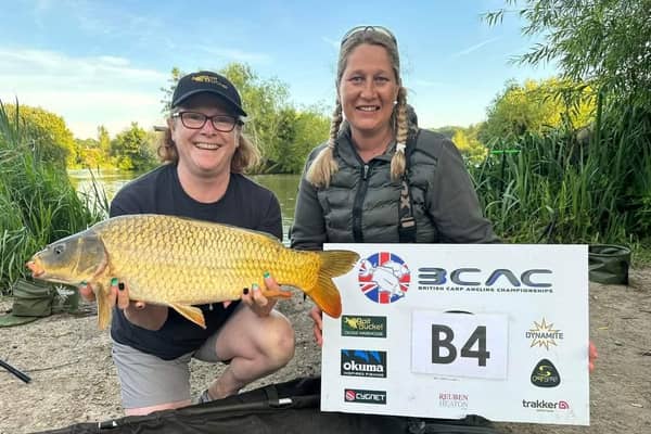 Joanne Barlow and Nikki Gordon (right) with one of their carp landed during the event.