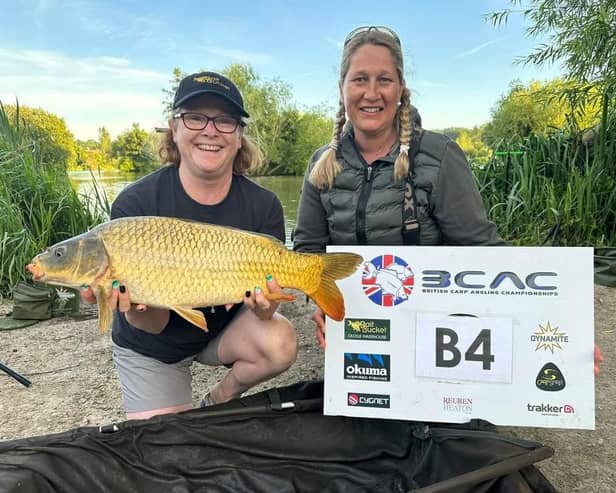 Joanne Barlow and Nikki Gordon (right) with one of their carp landed during the event.