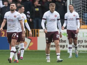 A dejected Hearts team after Motherwell opened the scoring at Fir Park. Picture: SNS